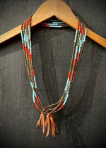 RTH LOVE KNOT NECKLACE - GOLD/LIGHT BLUE/RED GLASS PEBBLES WITH COGNAC KNOT