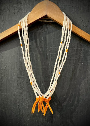 RTH LOVE KNOT NECKLACE - VTG ROUND OPAQUE WHITE WITH ORANGE SUEDE KNOT